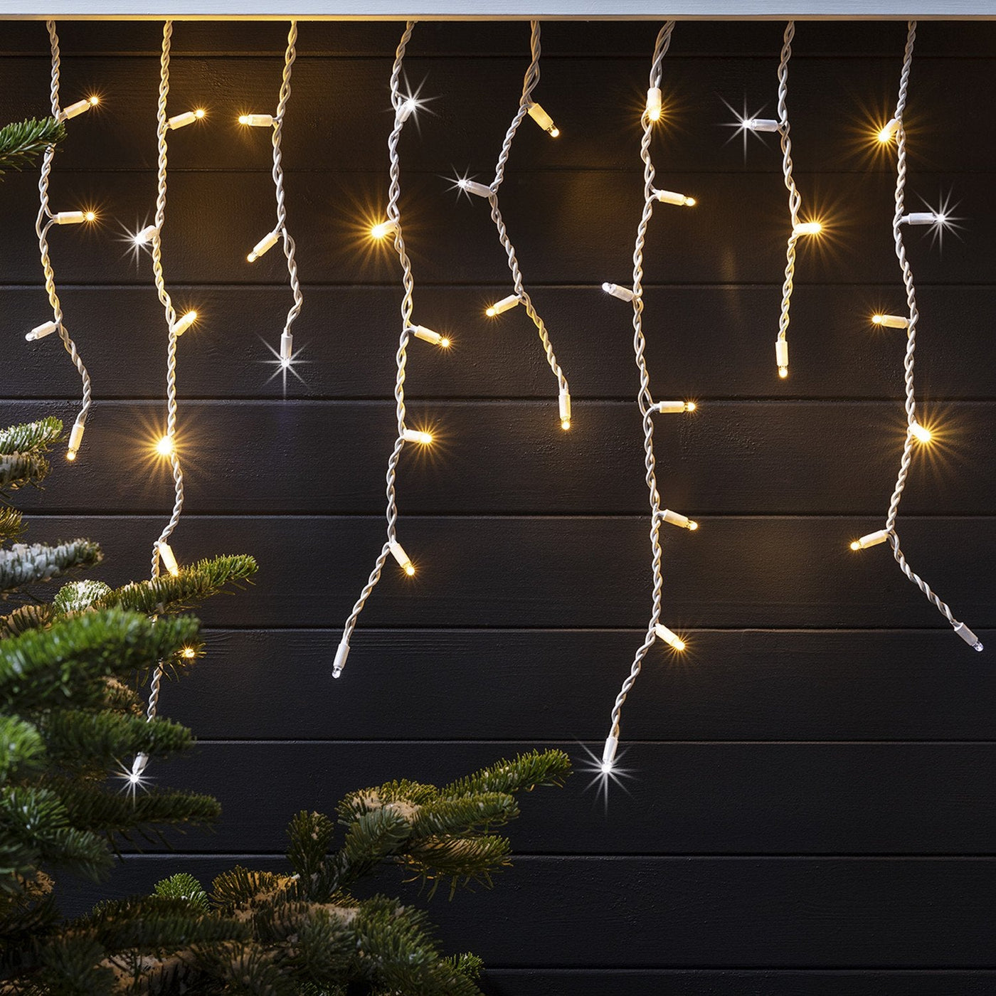 Icicle lights shop on tree