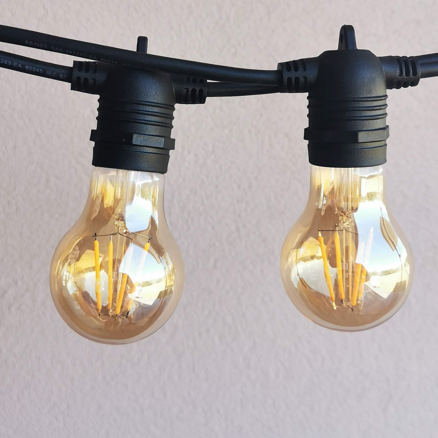 Dimmable Festoon Lights | 5.5m 10 Bulbs | A19 3w Amber | Flush